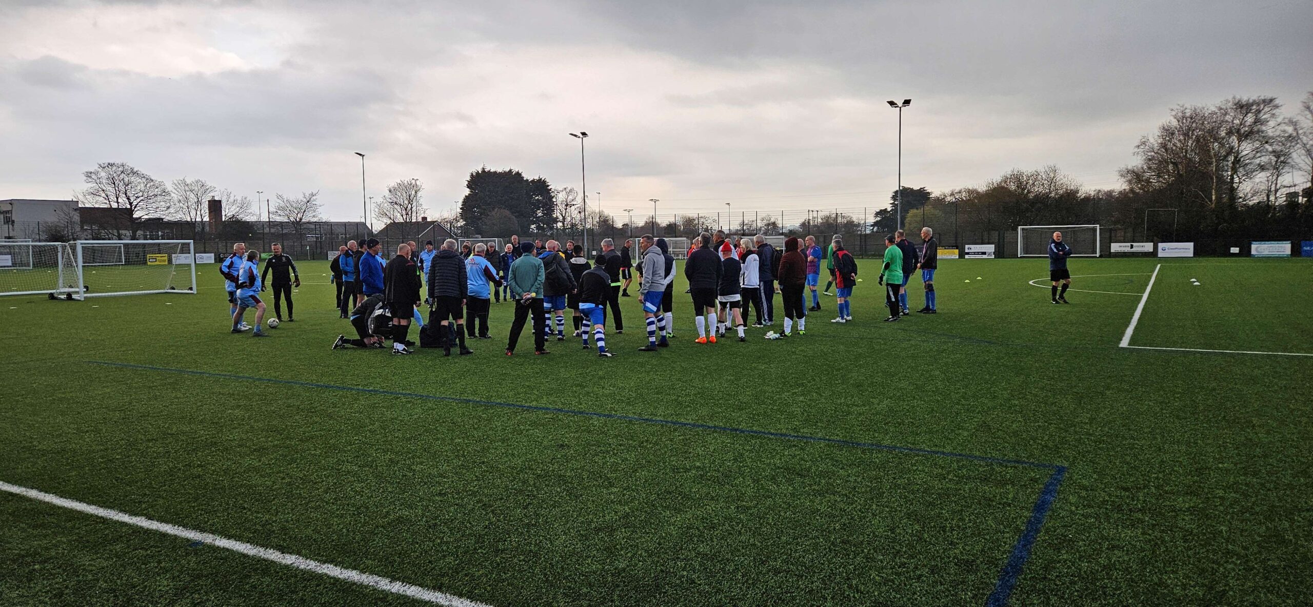 Referees huddle under an ominous sky!